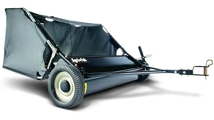 This image shows a leaf vacuum attachment connected to a zero turn mower for review.